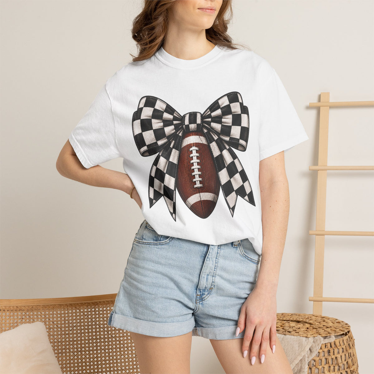 Woman’s Football Bow Tee