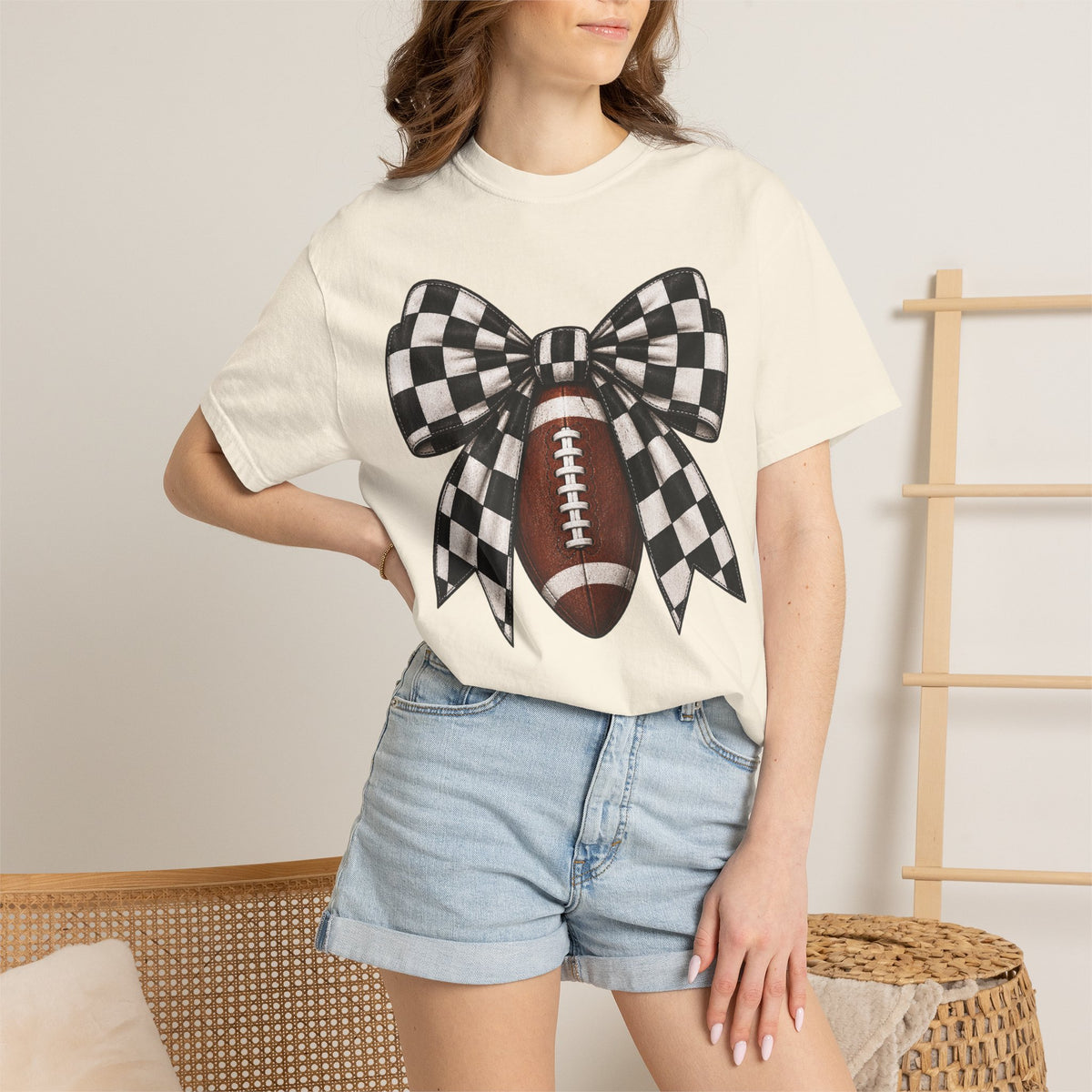 Woman’s Football Bow Tee